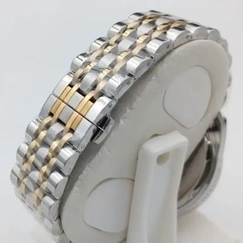 ساعت مچی مردانه رومانسون استیل طلایی صفحه طوسی موتور ژاپن کرنوگراف تقویمدار