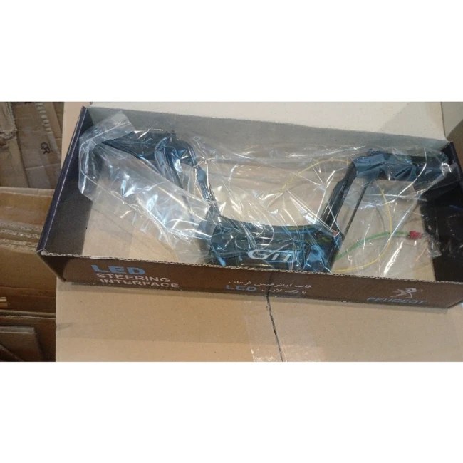 قاب اینترفیس فرمان پژو 207 طرح آرم پژو با بک لایت LED پسکرایه ارسال توسط تیپاکس