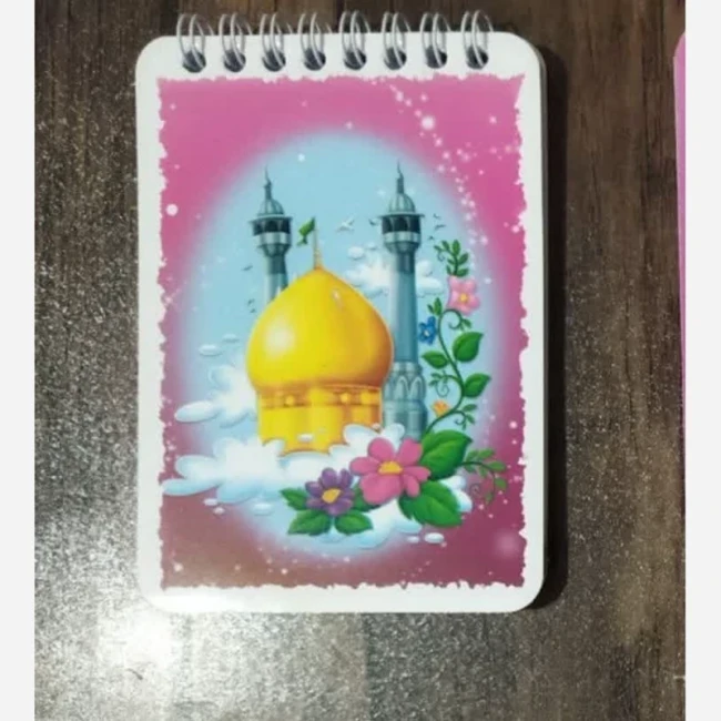 دفتر دخترانه دفترچه دخترانه فنری طرح حرم حضرت معصومه سلام الله علیها دفتر صورتی دفترچه صورتی مدادرنگی صورتی مداد رنگی 