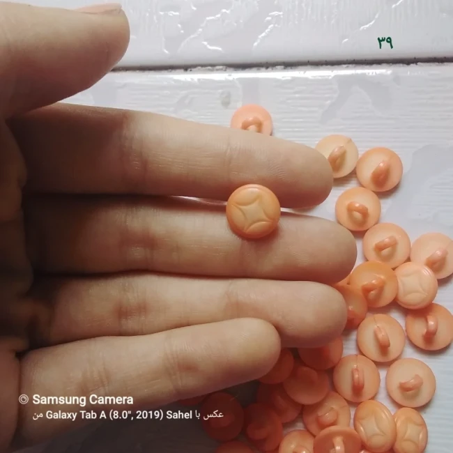 دکمه نارنجی طرح ستاره زیبا پک 39 تایی 