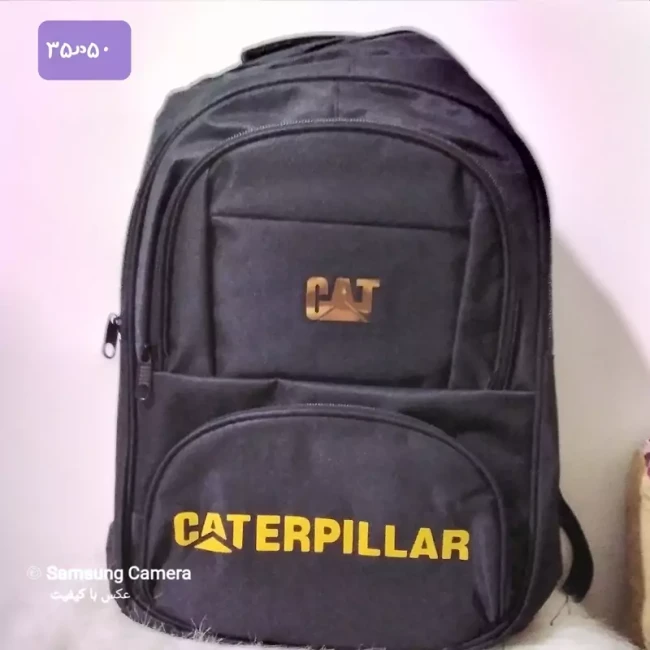 کوله پشتی جادار وجنس ودوخت عالی برند CAT دارای ورودی کابل  آیو ایکس جنس خارجی 