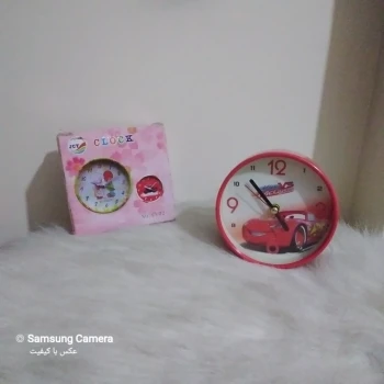 ساعت رومیزی شماطه دار طرح مک کوئین 