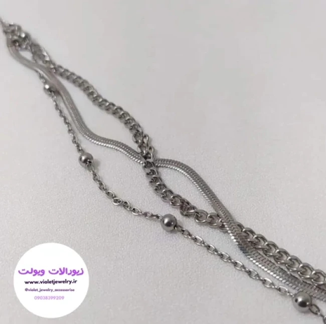 دستبند 3لاین جنس استیل رنگ ثابت نقره ای و طلایی کد 1396
