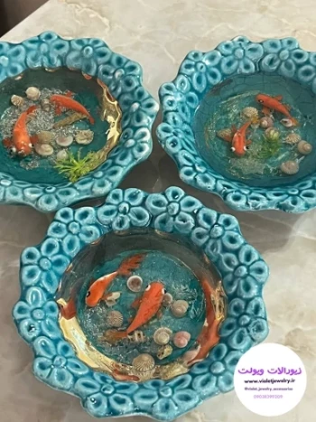 ماهی قرمز سه بعدی عید رزینی ظرف سفالی