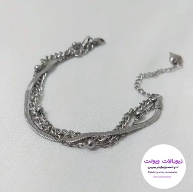 دستبند 3لاین جنس استیل رنگ ثابت نقره ای و طلایی کد 1396