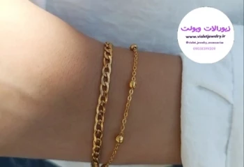 دستبند زنانه دولاین کارتیر و زنجیرتوپی طلایی استیل کد 1366