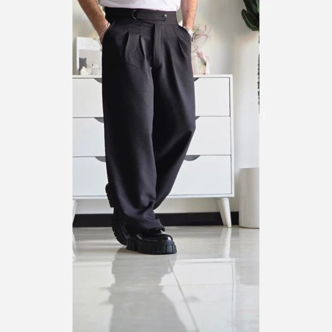 شلوار بگ پارچه ای کجراه مشکی کمر ایتالیایی پیله دار زنانه سایز L تا 3XL