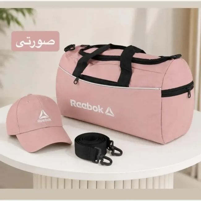 ساک ورزشی پارچه ای بند دار با سه جیب بیرونی ابعاد 45 در 25 در 15 سانتیمتر