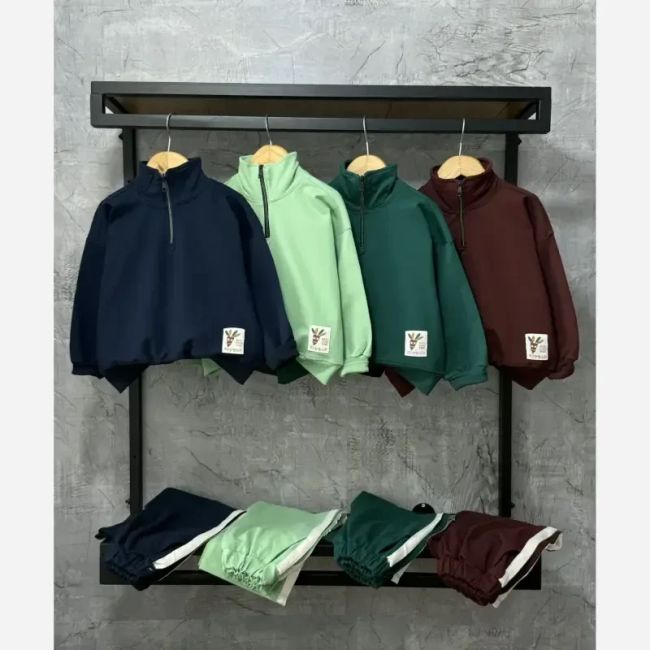 ست بلوز و شلوار دخترانه دورس دو نخ لاکرادار نیم زیپ