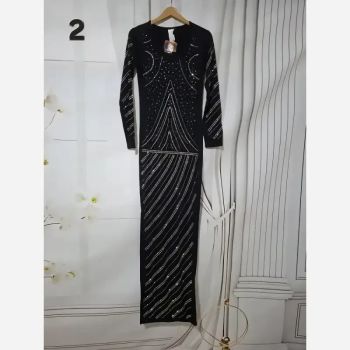ماکسی مجلسی زنانه منجوق و نگین کاری شده جنس ریون کشی اعلا چاکدار