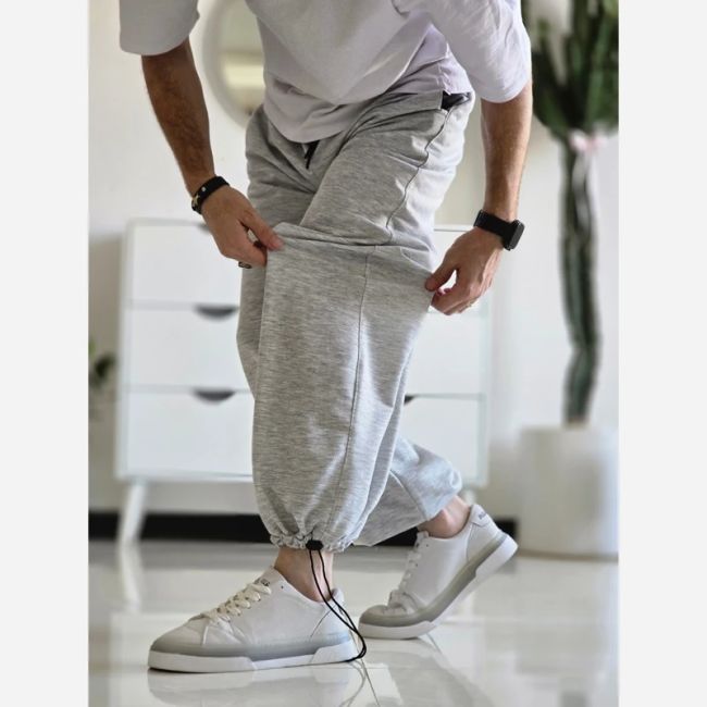 جاگر کلوین کلین اسلش ملانژ دمپا گت دار مناسب آقا و خانم سایز XXL و XXXL طوسی مشکی برفی